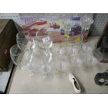 A collection of glassware, to include a pair of candlesticks, 4 brandy balloons and 8 sherry
