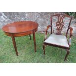 A 19th century mahogany fold over table, width 36ins, together with 19th century open arm dining