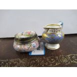 A19th century English porcelain miniature jug, together with a 19th century enameled patch pot,