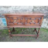 An oak sideboard, with moulded decoration width 42ins , depth 18ins height 33ins