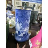 A Royal Doulton vase, decorated in blue and white with children