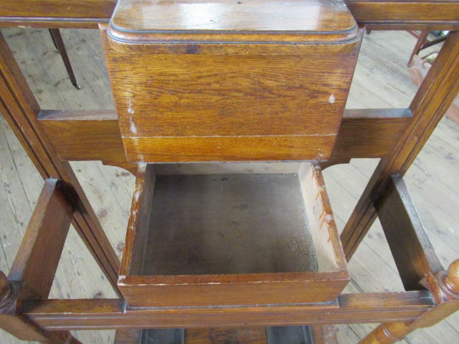 An Edwardian oak hall stand, with mirror, coat hooks, glove box and stick stand, height 77ins, width - Image 2 of 2