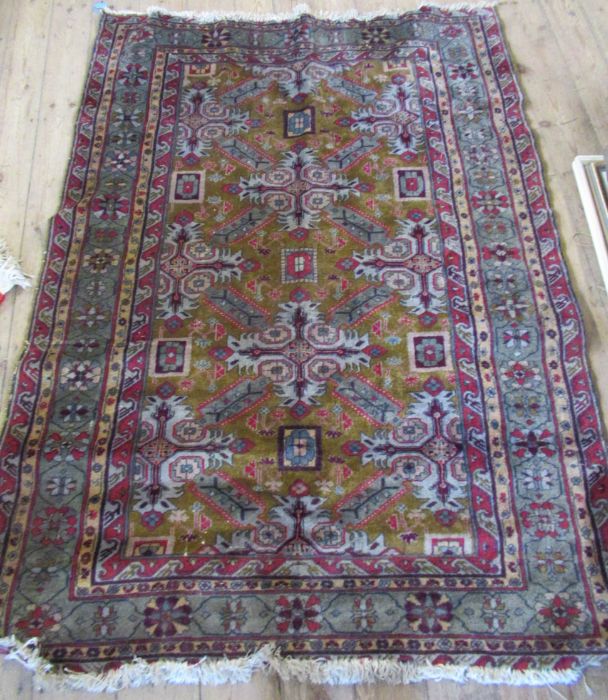 An Eastern design rug, with gulls to the field, 77ins x 53ins