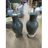 A pair of green glazed table lamps and others