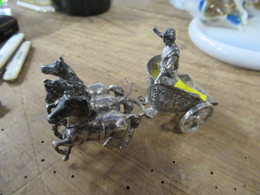 A continental silver model of a chariot pulled by horses