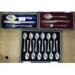 Two cased silver christening sets, knife, fork and spoon, together with a cased set of twelve silver