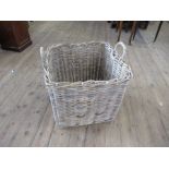 A square wicker basket, 25ins x 24ins, height excluding handles 23ins