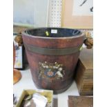 An oak country house bucket, transfer printed with the royal coat of arms, having a rope handle
