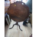 A 19th century pie crust mahogany table, height 27ins, diameter 29ins