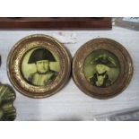 A pair of circular portrait miniatures of Nelson and Napoleon