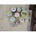 Eight enamel patch boxes, to include Halcyon Days and three porcelain patch boxes