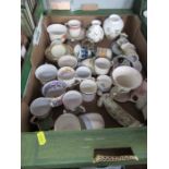 A box of assorted china, to include Wedgwood, coffee cans etc