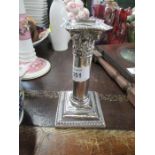 A hallmarked silver candlestick