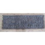 A Continental carved wooden rectangular panel, with scroll decoration, 56ins x 18ins