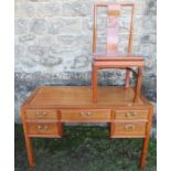 An Eastern design desk, 48ins x 22ins, height 30ins, together with similar chair