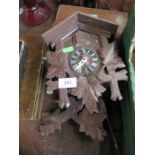 A wooden cased cuckoo clock
