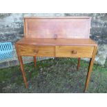 An Arts and Crafts design desk, width  36ins, depth 21.5ins , height 40ins