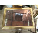 A modern rectangular wall mirror, with gilt frame and bevelled plate, plate size 19ins x 28ins