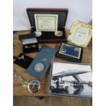 A collection of Concorde memorabilia, to include cuff links, badge, pocket watch, Wedgwood frame