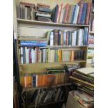 Six shelves of books to include reference books, paper backs etc