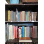 Five shelves of books and records