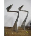 A pair of aluminium retro candlesticks, relating to Concorde, height 9.5ins