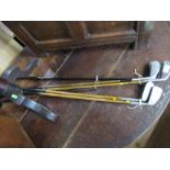 A collection of Vintage golf clubs including Hickory Shafted examples