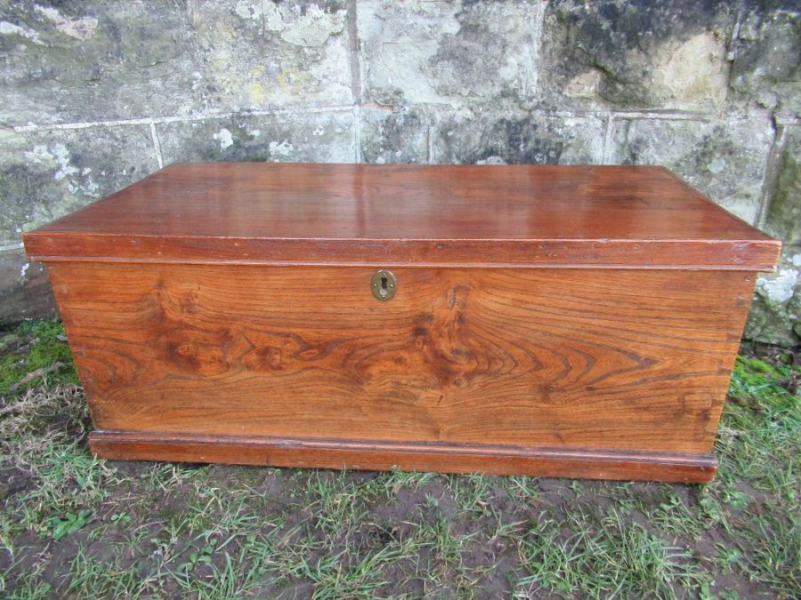 A 19th century elm box , width 31ins, depth 15ins, height 12ins