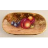 A small Royal Worcester oblong dish, decorated with fruit to a mossy background by Freeman, length