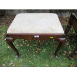 A walnut framed foot stool, with a Waring & Gillows stamp, 21ins x 15ins,  together with a leather