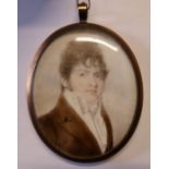 A 19th century oval portrait miniature, painted on ivory, of a gentleman, maximum diameter 3ins .