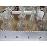 A box of assorted decanters