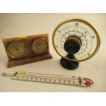 A Jaejer barometer, a Negretti and Zambra thermometer together with a British  Rototherme