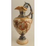 A Royal Worcester pedestal ewer, decorated with flowers to a gilded ivory ground, shape number 1309,