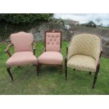 An Edwardian easy chair, together with an open arm chair and a 19th century style tub chair