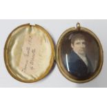 Oval miniature of a gentleman in a yellow metal frame the case labelled Thomas Baxter of