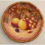 A Royal Worcester side plate, decorated with fruit to a mossy background by Shinnie, with shaped