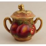 A Royal Worcester miniature covered sugar box, decorated all round with fruit to a mossy