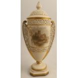 A Graingers Worcester reticulated covered vase, the ivory body decorated with a view of Worcester