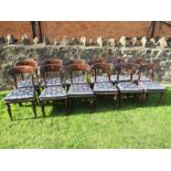 A set of twelve 19th century mahogany bar back dining chairs