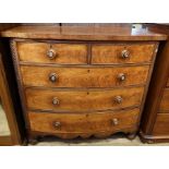 A 19th century mahogany bow front chest, of two short over three long drawers, with column