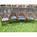Four similar Regency style open arm dining chairs