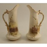 A pair of Graingers Worcester gilded ivory jugs, decorated with a view of Worcester and Stratford-