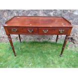 A 19th century mahogany washstand,fitted two frieze drawers, raised on turned legs, 36ins x 19.5ins,