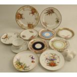 A Royal Worcester plate, decorated with a bird and poppies, together with another Worcester plate,