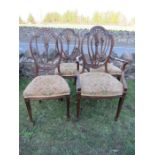 A set of four dining chairs (3+1)