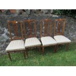 A set of four Edwardian style dining chairs
