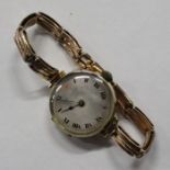 A 15ct gold cased ladies watch, with strap