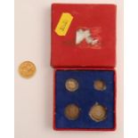 An Edward VII gold half sovereign, dated 1906, weight 4.0g, together with a set of George VI