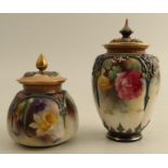 A Royal Worcester quarter lobbed covered vase, decorated with flowers, shape number H169, height